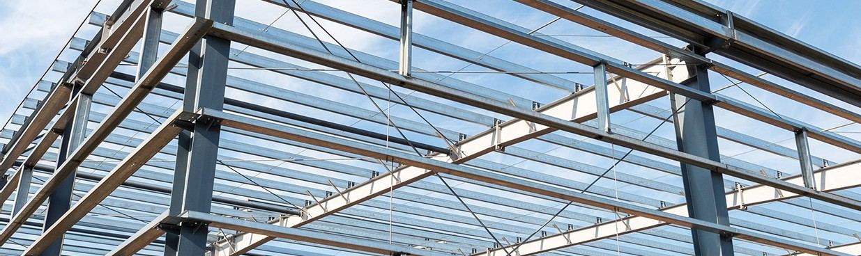 Steel roof framing of a pre-engineered building under construction